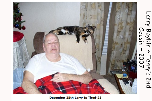 <larry boykin sleeping cat>